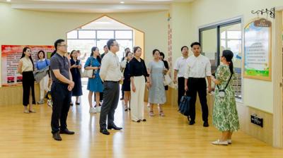 中国新高教集团高层携两所职业学院访问问鼎在线(中国)